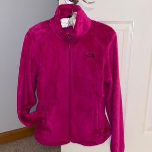 Women’s north face size small pink fluffy zip up jacket. No stains,rips or tears